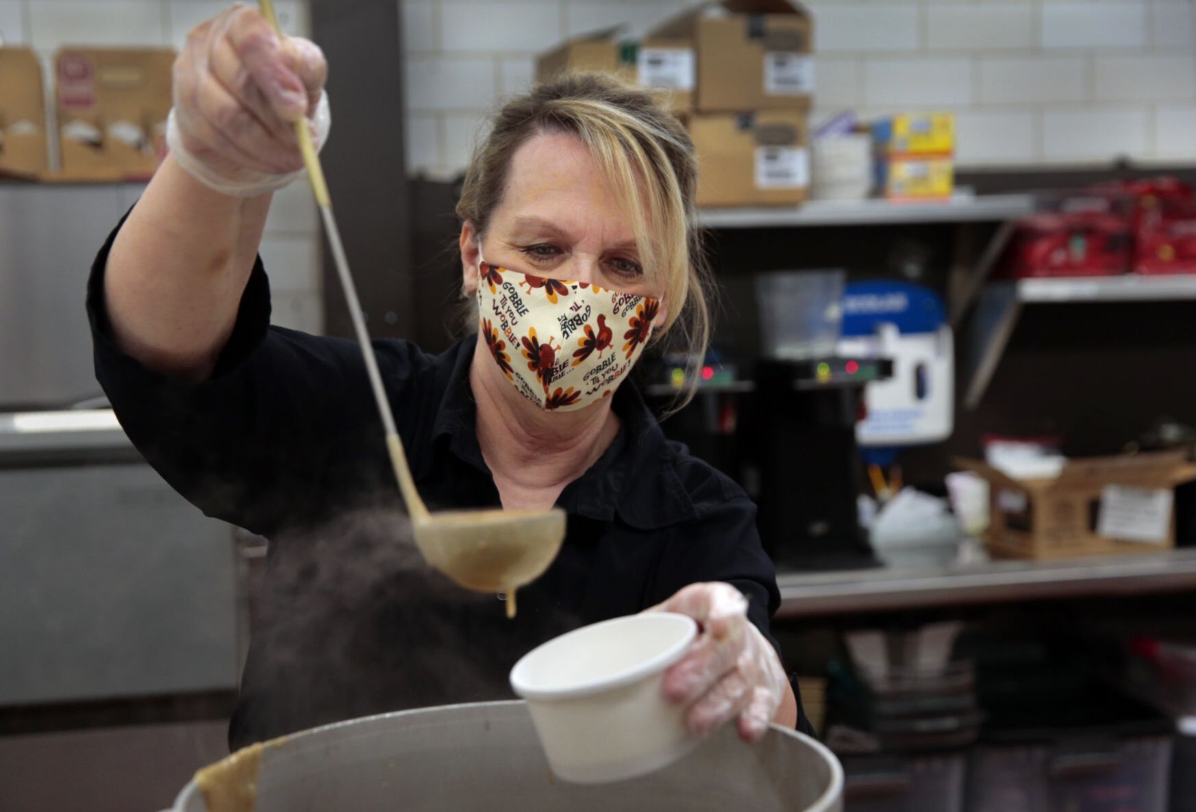 Temple preserves their Thanksgiving tradition, feeding the hungry with an eye on the virus